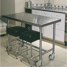Stainless Steel Tables And Cabinets For The Home Kitchen Home Kitchens Stainless Steel Kitchen Island Steel Table