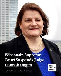 NEW: The Wisconsin Supreme Court has suspended Milwaukee County Circuit  Court Judge Hannah Dugan after she was arrested by the FBI and charged last  week for allegedly helping an undocumented immigrant evade