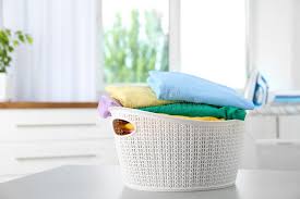 With an easy lift lid and comfortable carrying handles, victor is the. Basket With Clean Laundry On Floor Near Color Wall Stock Image Image Of Background Pile 149094195