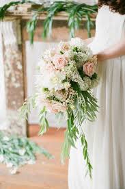 The pinecone wedding bouquet may not be for everyone but we certainly think they are both rustic and chic. Rustic Elegance Rustic Bridal Bouquets Bride Flowers Wedding Flower Inspiration
