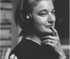 Jane Siberry wearning headphones. From an insert in The Walking. Photo by Peter Mettler. Back to the main images page. - headphon