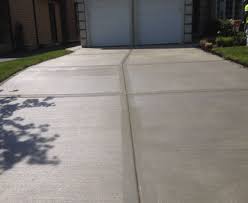 4+ inch thick, fibermesh reinforced 3500 psi concrete. Driveway Installation Repair Brick Mason Nashville