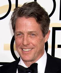 Hugh Grant Short Wavy Black Hairstyle