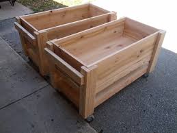 In spring, keep the garden in direct sunlight to give the plants a healthy start. Raised Planter Boxes On Casters Raised Planter Boxes Planter Boxes Garden Boxes Diy