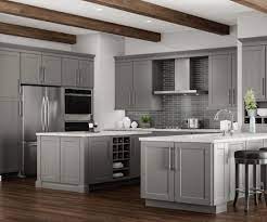 A modern kitchen island in chrome or painted in a deeper or contrasting colour to the wall cabinets will make it a focal point in a grey kitchen. Gray Kitchen Cabinets Kitchen The Home Depot