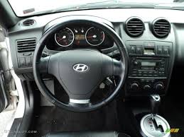 Image result for Pewter Silver 2003 Tiburon