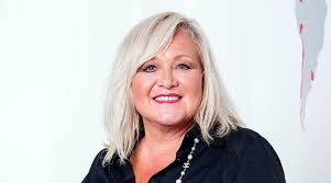 Highly ranked Atlanta real estate agent moves to new brokerage, taking 25  agents with her