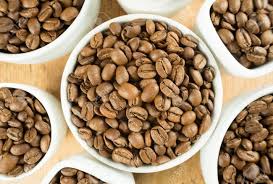 Light Roast Brown Coffee Beans In White Cups On A Wooden Table Stock Photo Picture And Royalty Free Image Image 96225143