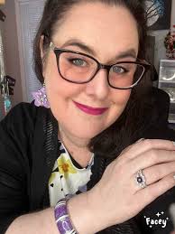 Her favorite color is purple. She had to get a few purple flowers in the  mix. I wish I could keep her little forever.