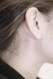 Small hamsa tattoo behind the ear. 20 Cute Behind The Ear Tattoos For Women In 2021 The Trend Spotter