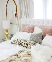 The gold bedroom chandelier is the perfect fixture for this modern city space. Grey And White Bedroom With Gold Accents Novocom Top