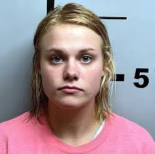 Police said the boy was allegedly allowed to run next to the car while  25-year-old Katie Lynn White was driving. She now faces charges of domestic  battering, aggravated assault, and endangering the
