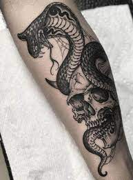 15 Traditional Skull And Snake Tattoos In 2021 Cobra Tattoo Tattoos Thigh Sleeve Tattoo
