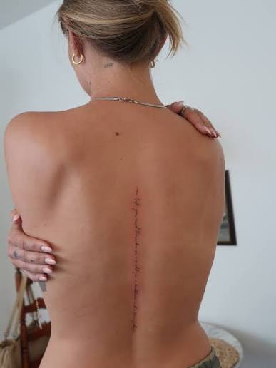There's something about a classic script spine tattoo that wins my heart every time..