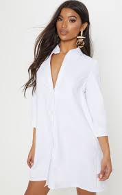 Leni White Shirt Dress Dresses Prettylittlething Prettylittlething 3/15 sleeve stried t shirt dress , sundress, side slit hem ,side pockets you 'll like it. leni white shirt dress