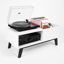 On such record players, the platter is attached to a rubber belt, which is then attached to the spindle of the motor. Record Box Record Player Lowboard Hhv