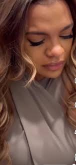 Person crying over rooster's head house