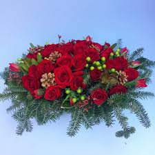 Unlike a floral bouquet, blooming plants will need maintenance in order to thrive and produce the desired blooms. Festive Table Holiday Flower Arrangement
