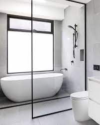 Want a tub directly under a skylight in the middle of the room? Wetroom Shower With Freestanding Tub Are The Tubs Tilted For Slope