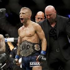 View complete tapology profile, bio, rankings, photos, news and record. Tj Dillashaw Will Defend Both Ufc Flyweight And Bantamweight Titles With Win Over Demetrious Johnson Mmamania Com