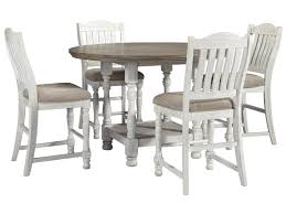 Bring fresh farmhouse charm to your kitchen or dinette with the jofran madison county 3 piece counter height dining set. Millennium Havalance D814 13 4x124 Round Dining Room Counter Height Table And 4 Upholstered Barstools Set Sam Levitz Outlet Dining 5 Piece Sets