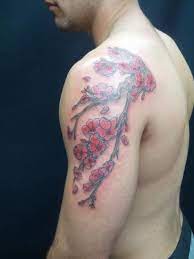 When Men Think About Tattoo Designs A Flower Isn 39 T Generally One Of The First Things That Comes To M Cherry Blossom Tattoo Tattoos For Guys Blossom Tattoo