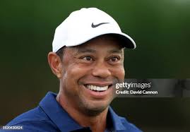 Tiger Woods of The United States poses with Sammy Eldin one of his... News  Photo