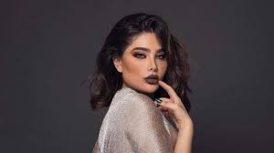 إنجي خوري من مظاهرات لبنان إلى نوادي الإمارات الليلية neck dress high neck dress fashion