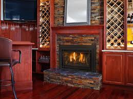 Custom built mantel in hand hewn knotty alder. A Kozy Heat Springfield36 Hearth Products Great American Fireplace In Menomonie Wi