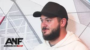 Raheem Morris and Terry Fontenot were allowed a team meeting with the  Falcons this morning after their Sunday night firing., Longsnapper Liam  McCullough says "tears were shed."