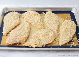 Shake off any excess and set the coated pieces aside. Easiest Baked Chicken Parmesan Recipe Somewhat Simple