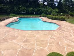 This Pool Deck Was Recently Transformed With Our Concrete Resurfacing From Plain Concrete To This Beautiful Random Painted Pool Deck Concrete Pool Pool Decks