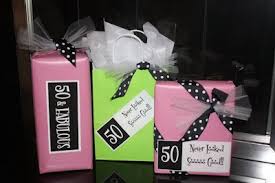 She hit the half century mark! Make It Delightful Custom Gift Wrap For A 50th Birthday Custom Gift Wrapping 50th Birthday Gift Wrapping
