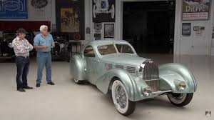Jay Leno Drives A Hand Built Replica Of The Missing 1934 Bugatti Aerolithe Can It Live Up To His Expectations Top Speed Bugatti Bugatti Type 57 Leno