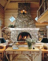 A kitchen, living space, and dining area are situated in an open floor plan in the main cabin, where a collection of vintage pieces. Cabin Decor Ideas Rustic Stone Fireplace Cabin Decor Rustic Cottage Decor