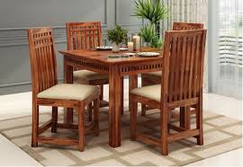 Measuring 68 x 36 inches, you can expect to sit at least six people comfortably, depending on the chairs. 4 Seater Dining Table Set Buy Four Seater Dining Set Online
