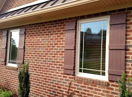 Today they are most often used to bring back the charm of that era in our history and to. Four Board Vinyl Shutters On Brick Home Architectural Depot