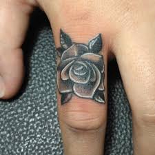 Finger tattoos come in different designs and sizes. Rose Finger Tattoo Ring Finger Tattoo Ring Finger Tattoos Finger Tattoo For Women Finger Rose Tattoo