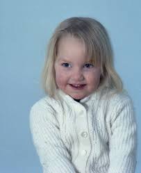 Identifying a Baby in a Wedding Photo from 1973