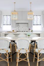 Serena Lily Riviera Side Chairs Sit At A Gray And Black Dining Table Illuminated By Bra Parisian Bistro Chairs French Bistro Chairs Bistro Chairs Dining Room
