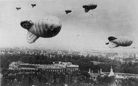 A barrage balloon is defined as a bag filled with lighter than air gas, that is attached to a steel cable, which is anchored to the ground. Datei Barrage Balloons Over London During World War Ii Jpg Wikipedia