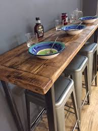 Bar table for the kitchen in the classic version is a rectangular rack with hanging shelves for glasses and dishes. Reclaimed Wood Breakfast Bar Table