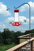 When it's time to refill, simply swing the feeder close and pour seed in. Deck Bird Feeder Poles At Backyard Wild Birds