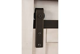 This barn door farmhouse bed uses pocket holes to join the wood together. Canton White Queen Barn Door Bed Walker S Furniture Panel Beds