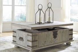 The cheapest offer starts at £10. Carynhurst Lift Cocktail Table From Ashley Furniture Lift Top Coffee Table Coffee Table With Storage Coffee Table Trunk
