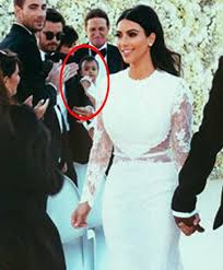 The bride models her dream wedding dress, a couture givenchy gown. Kim Kardashian And Kanye S Wedding Portrait With North Entertainment Emirates24 7