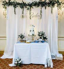 A baby shower decorated top to bottom with birch wouldn't be complete without a beautiful birchwood backdrop. A Little Man Bow Tie Teddy Bear Baby Shower Dreamery Events