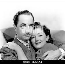 WILLIAM POWELL and MYRNA LOY as Nick and Nora Charles in ANOTHER THIN MAN  1939 director W. S. VAN DYKE characters Dashiell Hammett Metro Goldwyn  Mayer Stock Photo