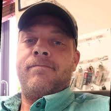 Estes congratulates Tim Jones