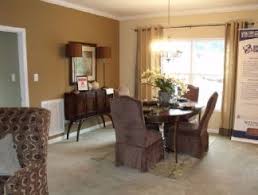 Formal den and living room spaces greet guests, while the family room, dining room, and kitchen areas reside in back of the home with easy access to the back yard. Whitfield 1969 Square Foot Ranch Floor Plan